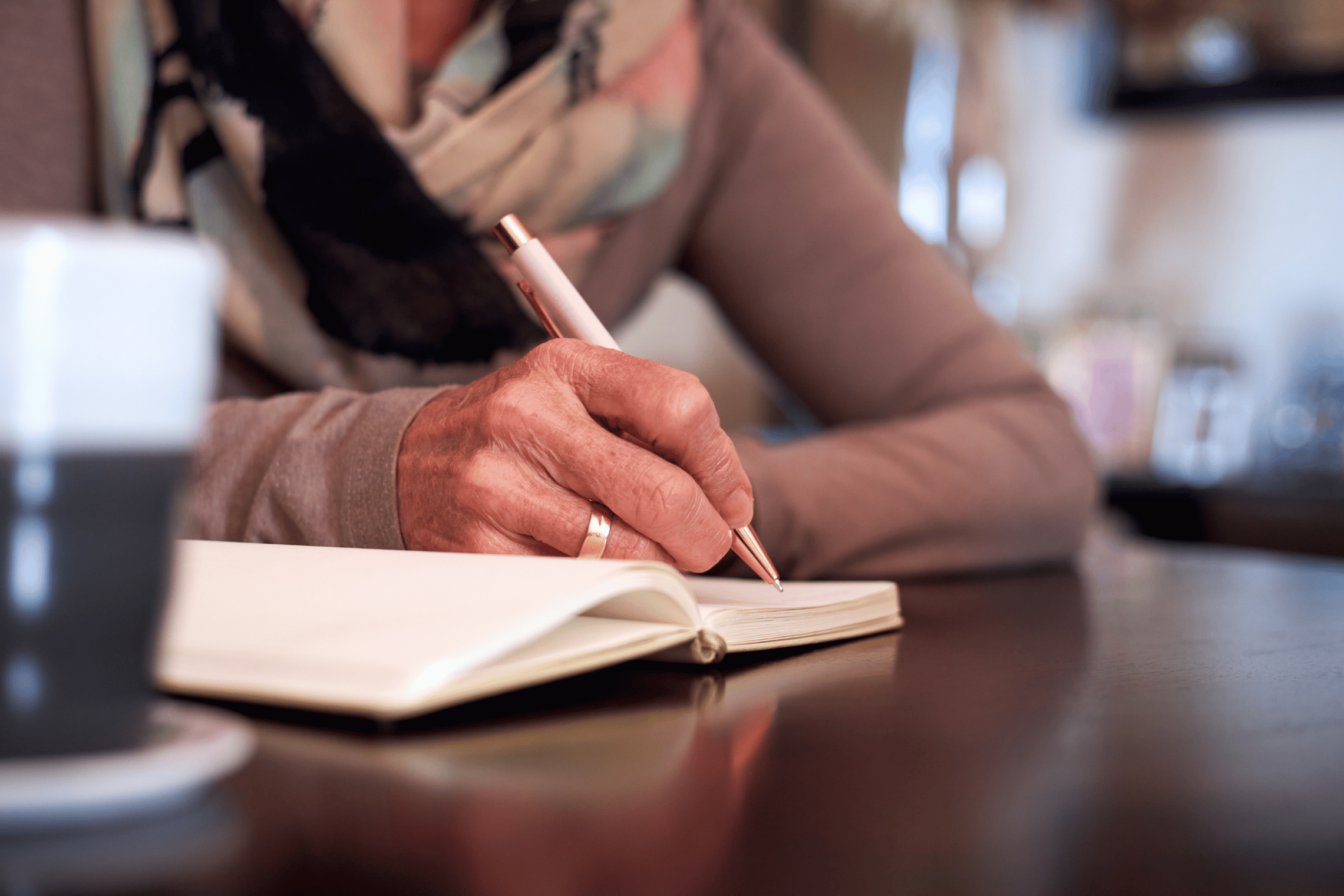 An image of a woman journaling