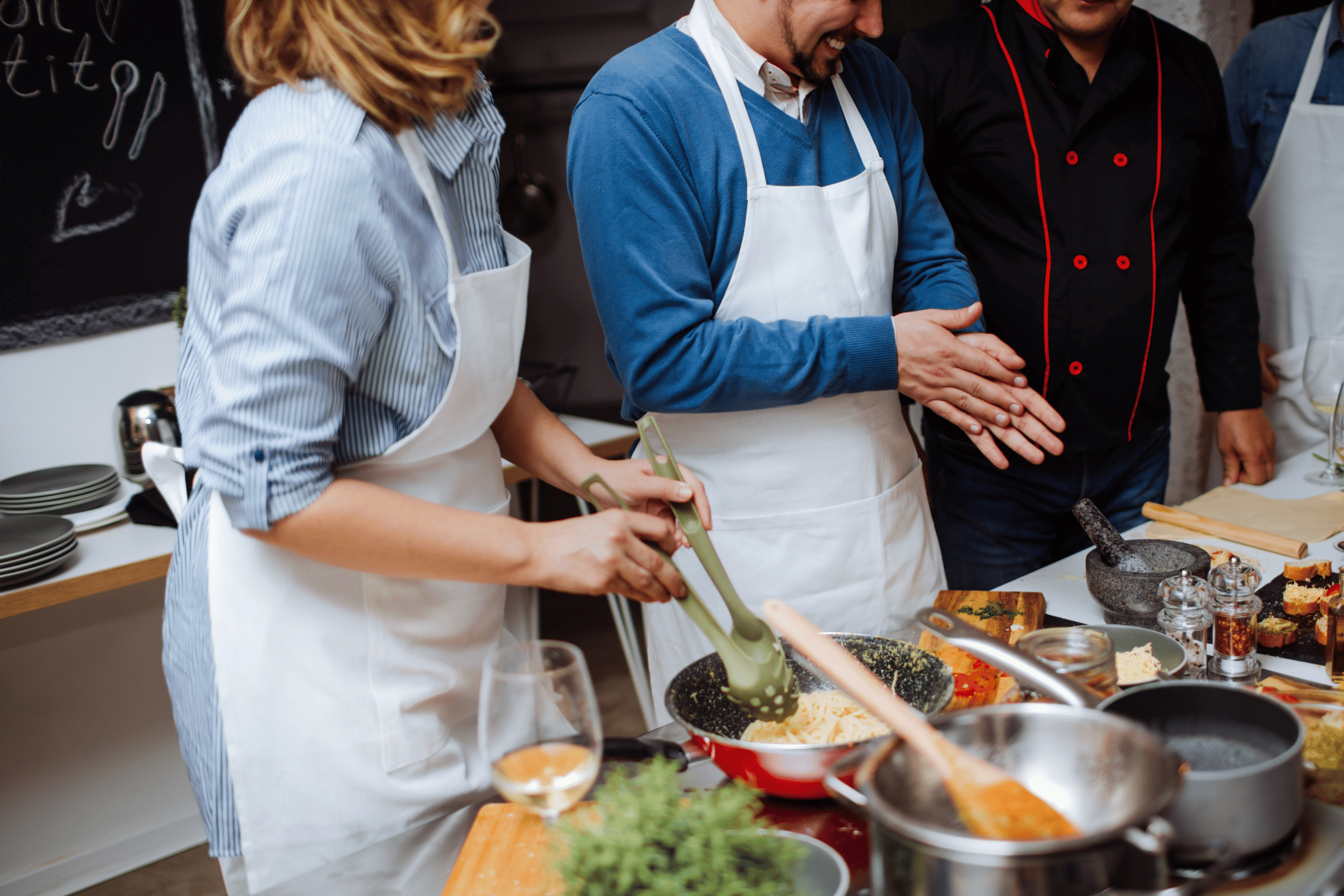 An image of a man and a woman in a cooking class