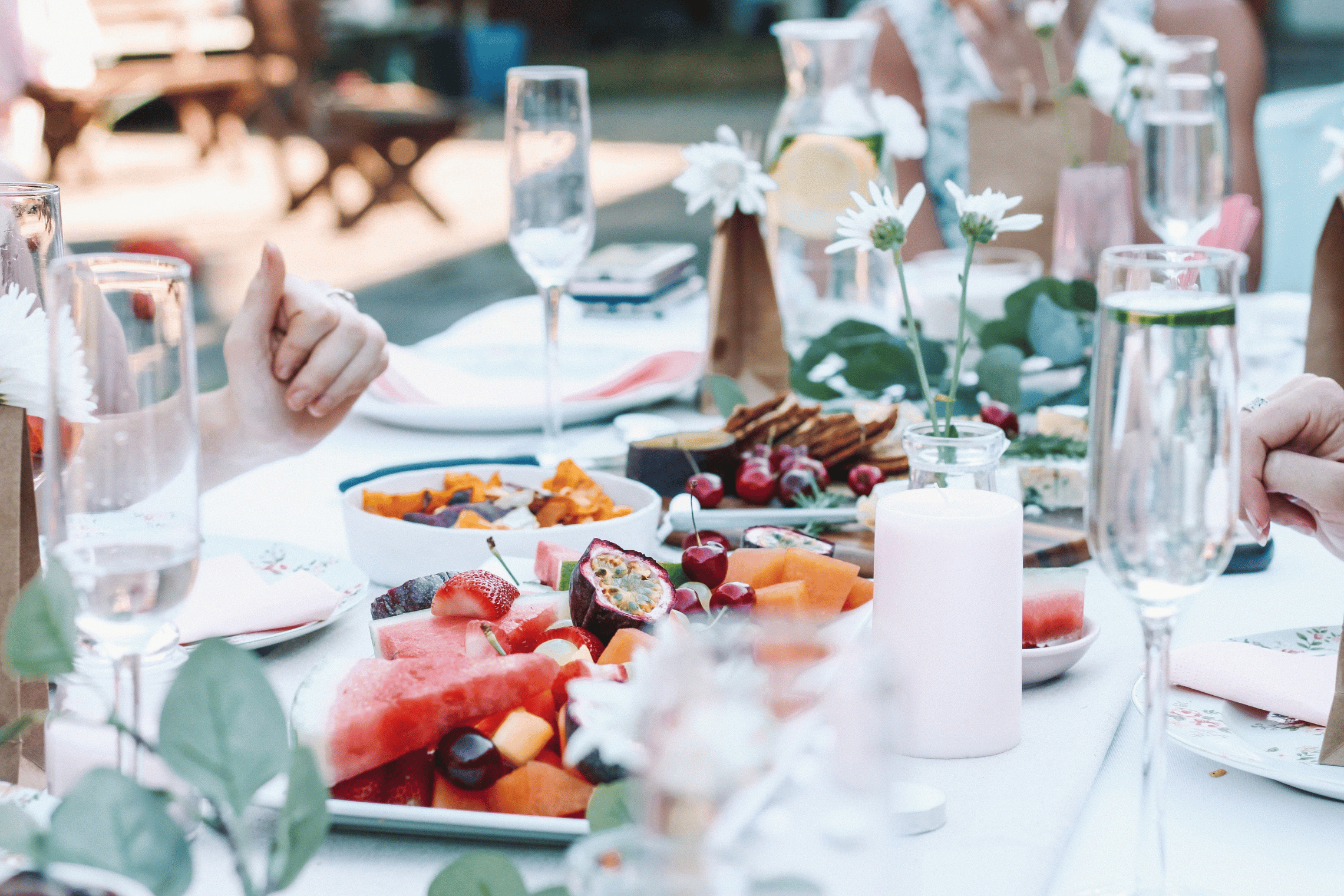 an image of a decorated dinner table outside